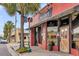 The Roost Bar N' Grille with a red brick exterior, nestled among other local businesses at 1391 Fairfield Ave, Charleston, SC 29407