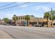 A diverse array of local businesses with unique architectural styles line a vibrant city street at 1391 Fairfield Ave, Charleston, SC 29407
