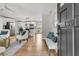 Inviting foyer showcasing an open floor plan with hardwood floors and modern decor at 1391 Fairfield Ave, Charleston, SC 29407