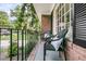 Cozy front porch with comfortable seating and a view of the beautifully landscaped yard at 1391 Fairfield Ave, Charleston, SC 29407