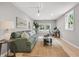 Comfortable living room with a sofa, windows, and a cozy rug at 1391 Fairfield Ave, Charleston, SC 29407