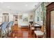 Bright dining area featuring wood floors, white trim, and a desk area at 1408 Goblet Ave, Mount Pleasant, SC 29464