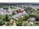 Beautiful aerial view of traditional homes in a neighborhood with lush landscaping and water features at 1494 N Lakeshore Dr, Mount Pleasant, SC 29466