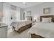 Neutral bedroom with two beds, carpet, and modern décor at 1494 N Lakeshore Dr, Mount Pleasant, SC 29466