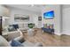 A comfortable living room is furnished with a sectional sofa and modern decor at 1494 N Lakeshore Dr, Mount Pleasant, SC 29466