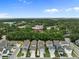 An attractive aerial view of the neighborhood and surrounding wooded areas at 1557 Kepley Dr, Mount Pleasant, SC 29464