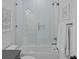 Bright, modern bathroom with subway tile shower, glass door, and brushed nickel fixtures at 1557 Kepley Dr, Mount Pleasant, SC 29464
