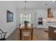 This dining room features hardwood floors, a chandelier, and connects to the kitchen at 1557 Kepley Dr, Mount Pleasant, SC 29464
