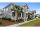 Beautifully landscaped home with inviting porch, lush greenery, and manicured lawn for a welcoming exterior at 1557 Kepley Dr, Mount Pleasant, SC 29464