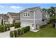 Beautiful home featuring a two-car garage, outdoor shower and beautiful landscaping at 1557 Kepley Dr, Mount Pleasant, SC 29464