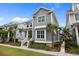 Charming two-story home boasts manicured landscaping, a welcoming porch, and classic architectural details at 1557 Kepley Dr, Mount Pleasant, SC 29464