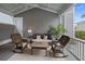 Relaxing covered patio with seating and natural light at 1557 Kepley Dr, Mount Pleasant, SC 29464