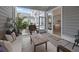 Relaxing screened-in patio with comfortable seating and natural light at 1557 Kepley Dr, Mount Pleasant, SC 29464