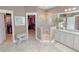 This luxury bathroom features a walk-in shower and access to a walk-in closet at 157 Village Ponds Dr, Summerville, SC 29483