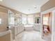 This bathroom features a luxurious soaking tub and glass enclosed shower at 157 Village Ponds Dr, Summerville, SC 29483
