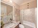 Cozy bathroom with a granite countertop and tiled shower-tub combination at 157 Village Ponds Dr, Summerville, SC 29483