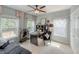 Well-decorated bedroom featuring a desk, seating area, ample natural light and ceiling fan at 157 Village Ponds Dr, Summerville, SC 29483