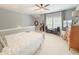 Bright bedroom boasting neutral walls, comfortable bed, and ample space for relaxation at 157 Village Ponds Dr, Summerville, SC 29483