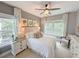 Inviting bedroom with natural light, neutral color palette, and coastal decor at 157 Village Ponds Dr, Summerville, SC 29483