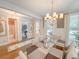 Open-concept dining area featuring modern lighting and neutral decor at 157 Village Ponds Dr, Summerville, SC 29483