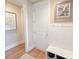 Elegant entryway featuring wood floors, wainscoting, and stylish decor at 157 Village Ponds Dr, Summerville, SC 29483