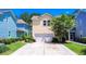 Charming two-story home with a well-manicured lawn and ample driveway parking at 157 Village Ponds Dr, Summerville, SC 29483