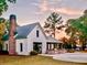 Charming community pavilion with brick fireplace, outdoor seating, and grilling area at 157 Village Ponds Dr, Summerville, SC 29483