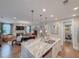 Island kitchen overlooking the living room creating an inviting space to cook, eat and relax at 157 Village Ponds Dr, Summerville, SC 29483