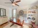 Stylish office featuring a ceiling fan, natural light, and hardwood floors at 157 Village Ponds Dr, Summerville, SC 29483