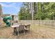 Backyard featuring a outdoor dining set and a custom built playhouse at 1576 Nautical Chart Dr, Charleston, SC 29414