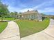 Charming one-story home with manicured lawn, stone accents, and attached garage at 1576 Nautical Chart Dr, Charleston, SC 29414