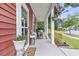 Cozy front porch with rocking chairs and tasteful decor, creating a welcoming entrance at 1576 Nautical Chart Dr, Charleston, SC 29414