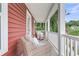 Charming front porch with cozy seating, providing a relaxing outdoor space to enjoy the surrounding views at 1576 Nautical Chart Dr, Charleston, SC 29414