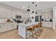Kitchen featuring a marble countertop island with pendant lighting and stainless steel appliances at 1576 Nautical Chart Dr, Charleston, SC 29414