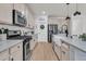 Well-equipped kitchen with stainless steel appliances, undermount sink and plenty of countertop space at 1576 Nautical Chart Dr, Charleston, SC 29414