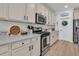 Kitchen features stainless steel appliances, a stylish gas range, and crisp white subway tile backsplash at 1576 Nautical Chart Dr, Charleston, SC 29414
