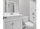 Bright bathroom features a white vanity, toilet, and bathtub with shower at 158 Hayworth Rd, Summerville, SC 29486