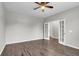 Bright room with hardwood floors, a ceiling fan, and French doors leading to another room at 158 Hayworth Rd, Summerville, SC 29486