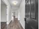 Open hallway with hardwood floors, neutral walls, and clear sightlines to rooms in the home at 158 Hayworth Rd, Summerville, SC 29486