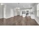 Open-concept kitchen featuring stainless steel appliances, white cabinetry, and a central island with pendant lighting at 158 Hayworth Rd, Summerville, SC 29486