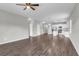A large living room featuring hard surface floors, an open floorplan and a view into the kitchen at 158 Hayworth Rd, Summerville, SC 29486