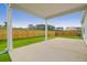 Covered patio overlooking a well-maintained, fenced backyard at 158 Hayworth Rd, Summerville, SC 29486