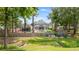 Expansive backyard with pool, trampoline, garden beds, and well-maintained lawn at 1607 Waterside Blvd, Moncks Corner, SC 29461