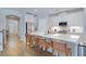 Bright kitchen with stainless steel appliances, white cabinets, and breakfast bar with seating at 1607 Waterside Blvd, Moncks Corner, SC 29461