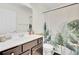Bathroom with a dark vanity, with a plant-themed shower curtain at 1634 Eider Down Dr, Summerville, SC 29483