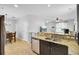 Kitchen with dark cabinets, stainless steel appliances, granite countertops, and an eat-in area at 1634 Eider Down Dr, Summerville, SC 29483