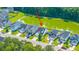 Aerial view of neighborhood by pond at 1689 Eider Down Dr, Summerville, SC 29483