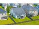Aerial view showcasing home's fenced backyard, screened porch and proximity to neighboring houses at 1689 Eider Down Dr, Summerville, SC 29483