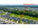 View of neighborhood at 1689 Eider Down Dr near a pond at 1689 Eider Down Dr, Summerville, SC 29483