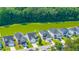 Aerial view of neighborhood homes and pond at 1689 Eider Down Dr, Summerville, SC 29483